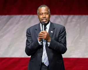 Ben Carson Holding A Mic Wallpaper