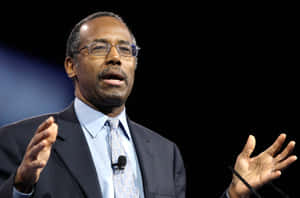 Ben Carson Speaking With Lapel Mic Wallpaper