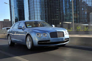 Bentley Flying Spur In Elegant Motion Wallpaper