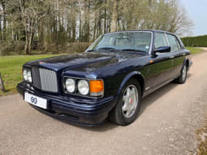 Bentley Turbo R Parked Outdoors Wallpaper