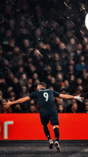 Benzema Celebrationin Rain Wallpaper