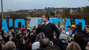 Beto O Rourke Speakingto Crowd Wallpaper