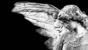 Biblical Angel Looking Down Wallpaper