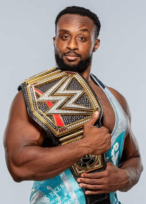 Big E Proudly Holding The World Heavyweight Championship Belt Wallpaper