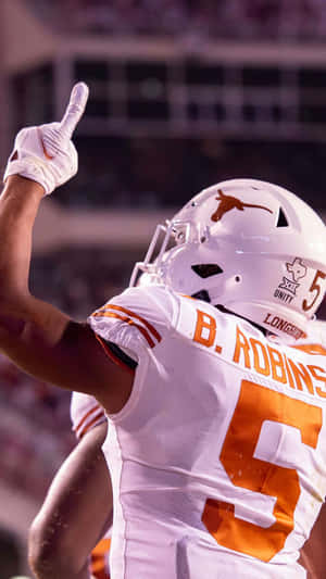 Bijan Robinson Texas Longhorns Celebration Wallpaper