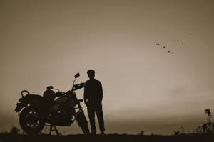 Bike Rider And Their Bike's Silhouette Wallpaper