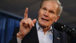 Bill Nelson Speaks Intensely In A Meeting Wallpaper