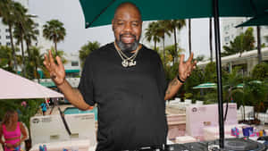 Biz Markie D Jing Poolside Event Wallpaper