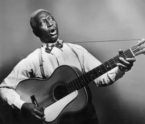 Black American Folk Singer Leadbelly Vintage Photograph Wallpaper