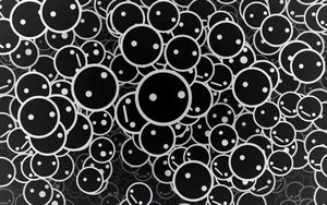Black And White Circles With Dot Eyes Wallpaper