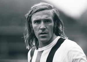 Black And White German Soccer Player Günter Netzer Tight Shot Wallpaper
