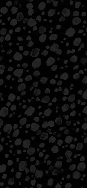 Black And White Pebbles On A Black Background Wallpaper