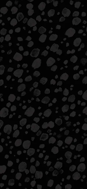 Black And White Pebbles On A Black Background Wallpaper