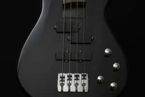 Black Bass Guitar Closeup Wallpaper