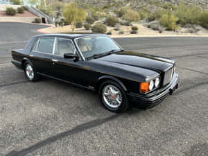 Black Bentley Turbo R Parked Outdoor Wallpaper