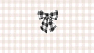 Black Bow On Plaid Background Wallpaper