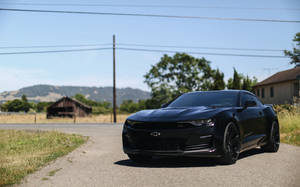 Black Chevrolet Camaro On Road Wallpaper