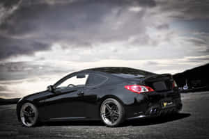 Black Coupe Dramatic Sky Wallpaper