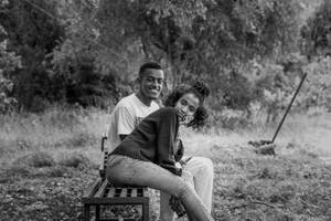 Black Couple On Bench Wallpaper