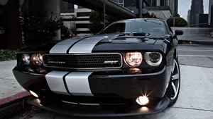 Black Dodge Challenger Urban Backdrop Wallpaper