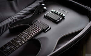 Black Electric Guitarin Case Wallpaper