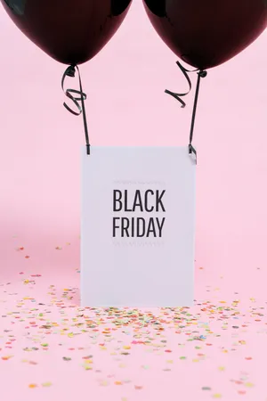 Black Friday Balloons With Confetti On Pink Background Wallpaper