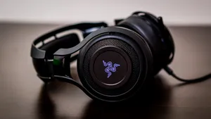 Black Gaming Headphoneson Desk Wallpaper