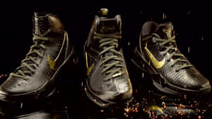 Black Gold Basketball Shoes Display Wallpaper