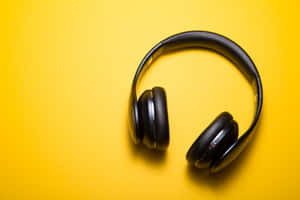 Black Headphones Yellow Background Wallpaper