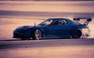 Black Mazda Rx 7 Drifting On Sand Wallpaper