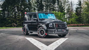 Black Mercedes G63 A M G Parked Outdoors Wallpaper