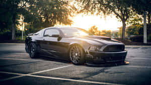 Black Muscle Car Sunset Parking Lot Wallpaper