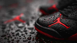 Black Red Jordan Sneakers Wet Surface Wallpaper