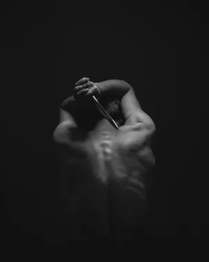 Black Spooky Paranormal Man Dagger Wallpaper