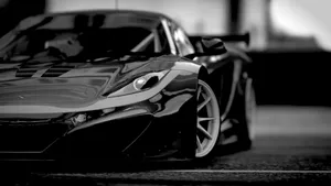 Black Sports Car Artistic Shot Wallpaper