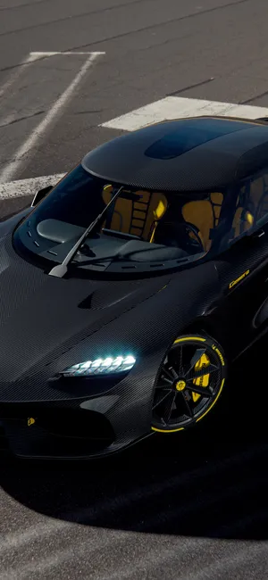 Black Sports Car Carbon Fiber Texture Wallpaper