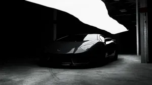 Black Sports Carin Shadowy Garage.jpg Wallpaper