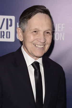 Black Suit And Tie Of Dennis Kucinich Wallpaper