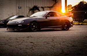 Black Toyota Supra Car At Dusk Wallpaper