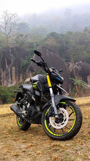 Black Yamaha Mt 15 With Yellow Rims Wallpaper