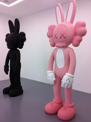 Blackand Pink Kaws Figures Wallpaper