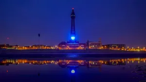 Blackpool Tower At Night With Blue Light Wallpaper