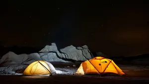Blissful Beach Camping Under The Stars Wallpaper