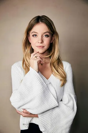 Blonde Actress White Sweater Portrait Wallpaper