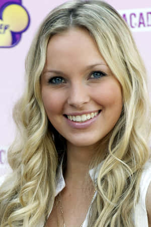 Blonde Celebrity Smilingat Event.jpg Wallpaper