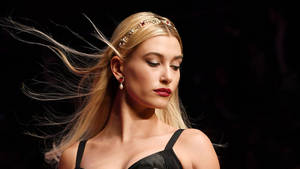 Blonde Dolce And Gabbana Model With Black Backdrop Wallpaper