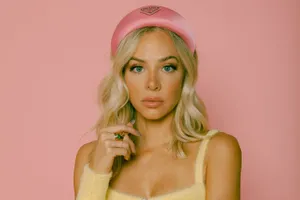 Blonde Woman Pink Beret Yellow Top Wallpaper