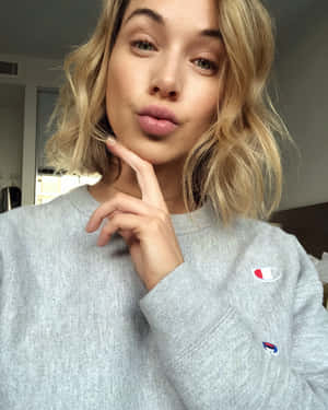 Blonde Woman Puckered Lips Grey Sweater Wallpaper