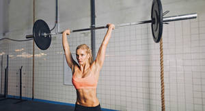 Blonde Woman Weight Lifting Wallpaper