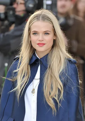 Blonde Womanin Blue Coat Wallpaper